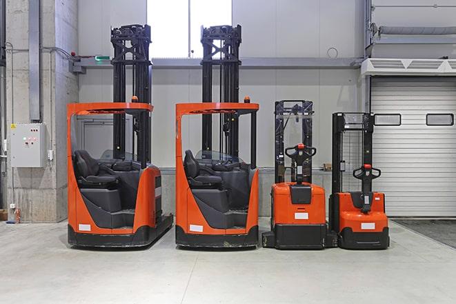 row of forklifts for material handling